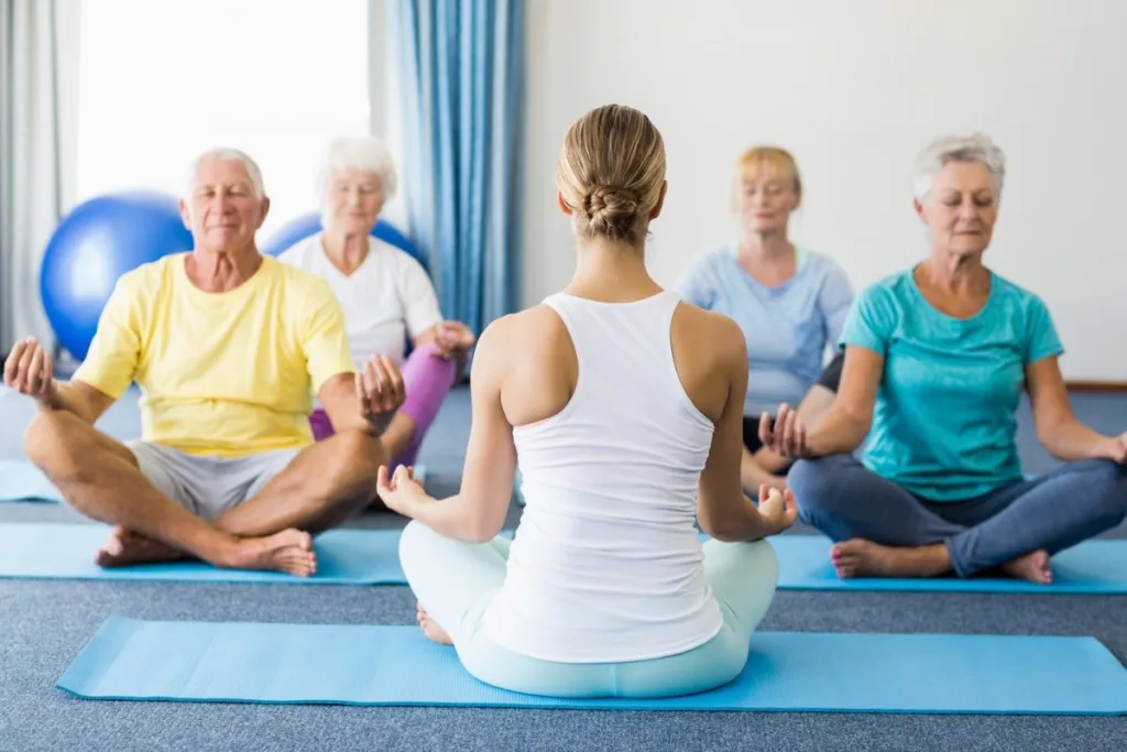 Older People Meditating During Yoga