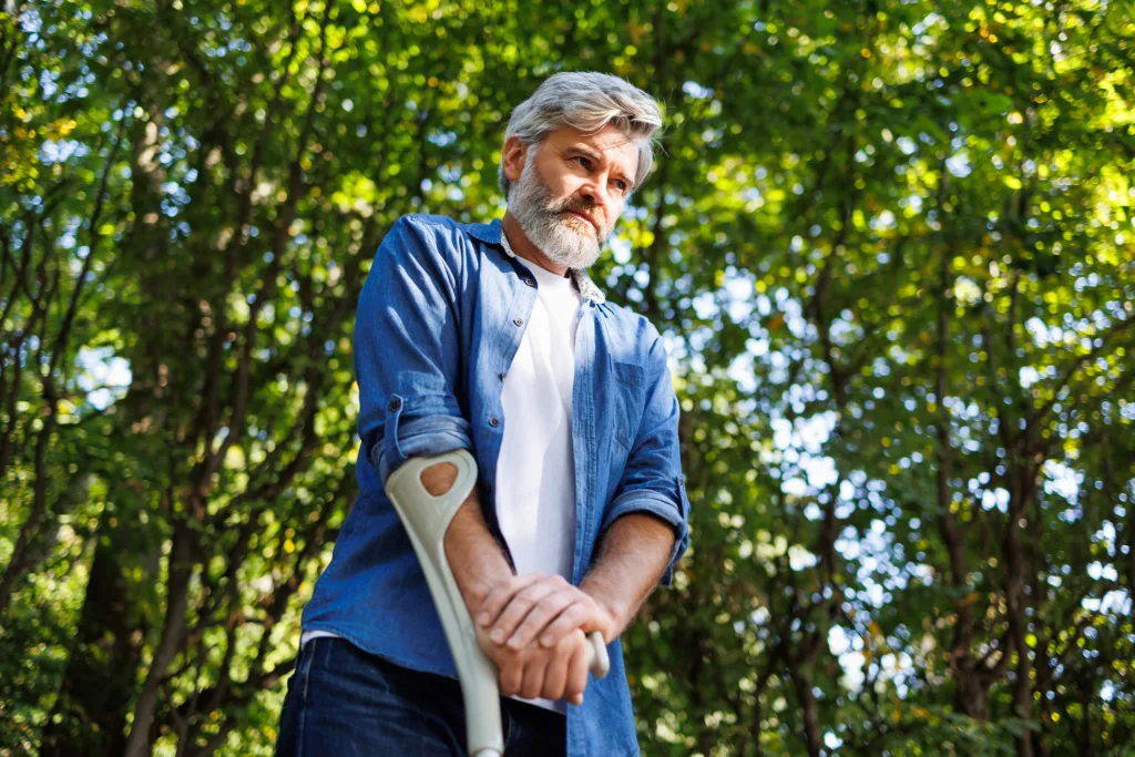 Park Reverie: A Gentleman's Stroll with a Crutch