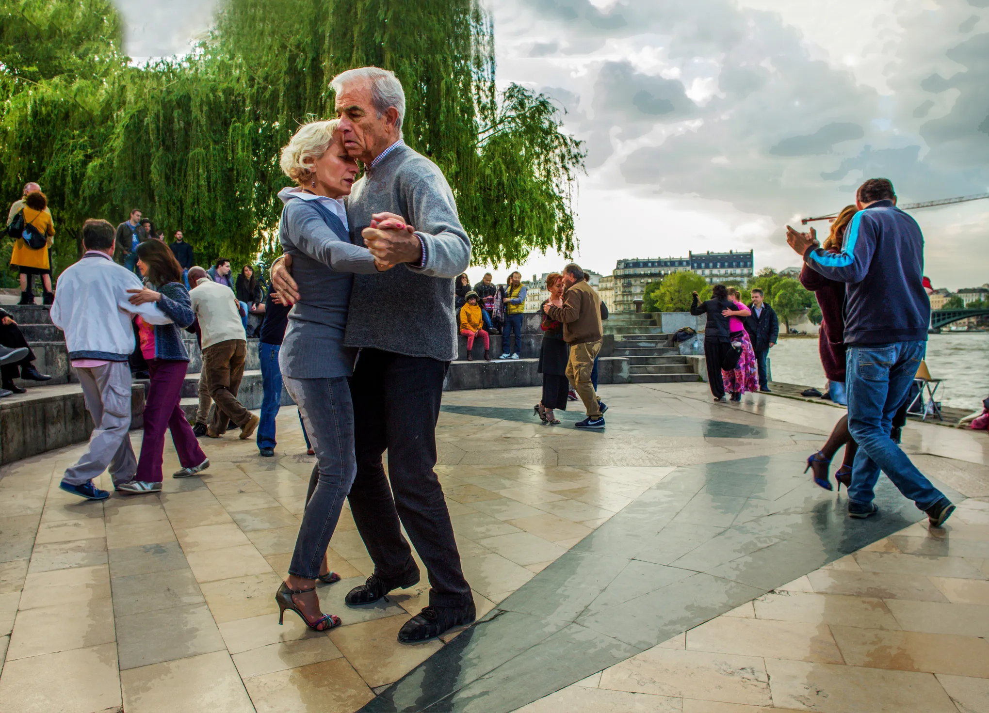 Dancing Tango on embankment of Paris Beautiful May in Paris. Next to Seine river
