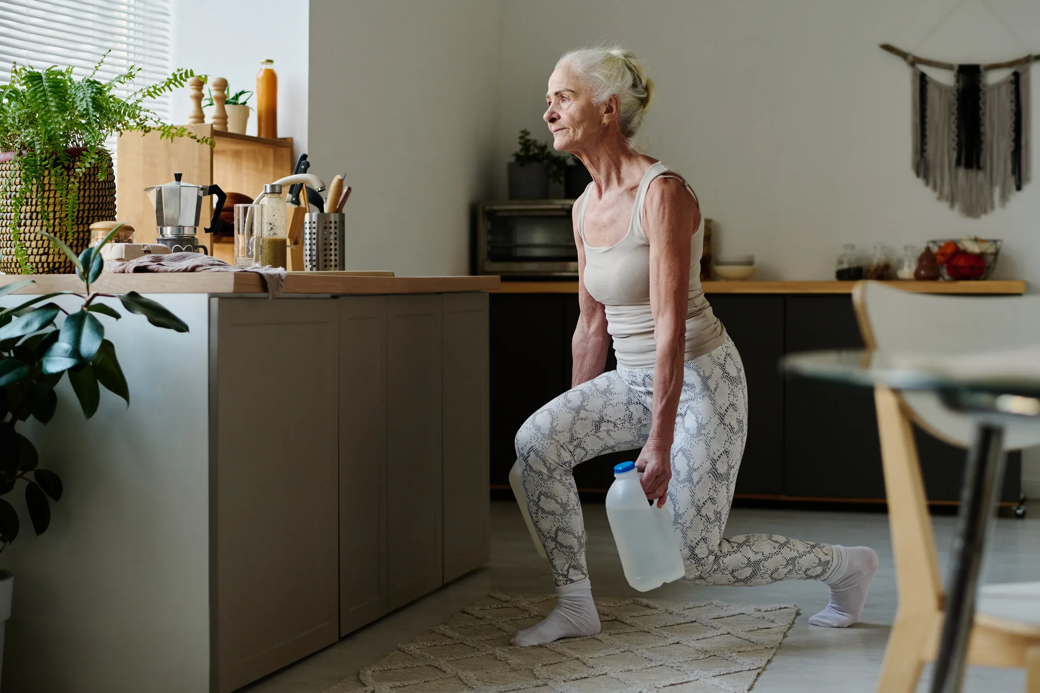 Woman doing physical exercise for legs